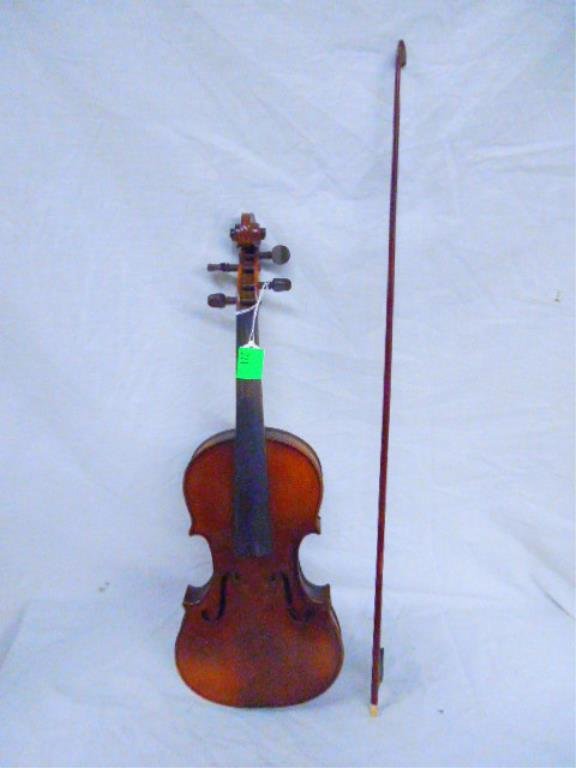 Violin: Violin, no markings, 3/4, with unmarked bow having an ivory nut, coffin case, no strings, bridge, etc.