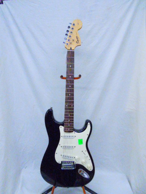 Fender Squire Strat Style Elec. Guitar: Fender Squire Strat Style Elec. Guitar Made in Indonesia. die cast machine heads. Comes with Gig Bag Condition: Good, used