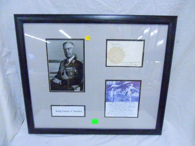 Framed Gustav V. Photo & Signed Paper: Framed King Gustav V, Sweden photo & signed paper w/seal, with Jim Thorpe picture & description, 22" x 26" framed, double matted. [5] CONDITION: Good for age, not authenticated.