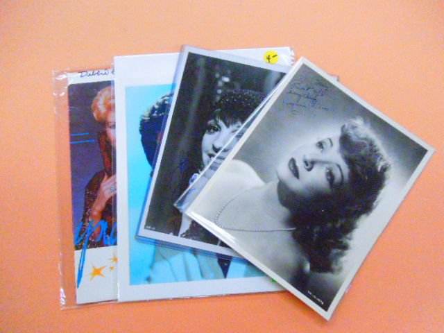 (4) Autograph Photos & Booklet: (4) Autograph Photos & booklet includes; (3) Photo's - Liza Minnelli, Virginia Bruce and Dean Martin (?), Plus Debbie Reynolds Booklet. CONDITION: Good, Dean Martin autograph in photo.
