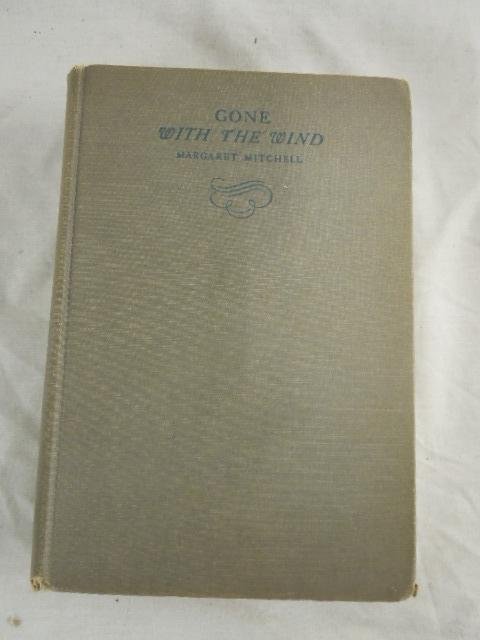 (1) Vol; Gone with the Wind 1936: (1) Vol; Gone With the Wind by Margaret Mitchell, 1936 The MacMillan Company 1936, First Year Printed (no dust jacket) 1037 pages. CONDITION: Cover has some wear at corners of cover, 1st 23 pages have