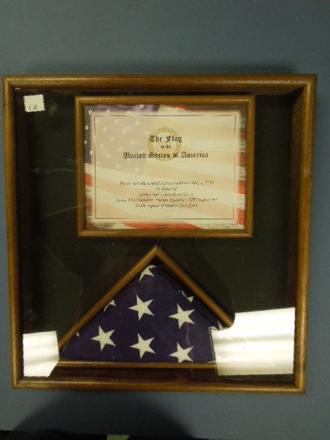 United States Flag Flown Over The Capitol: This is a display box of a flag that was flown over the US Capitol on July 1st 2010 in honor of Scott Crum's years of service as Vice President of Human Resources, ITT Corporation at the request of Ja