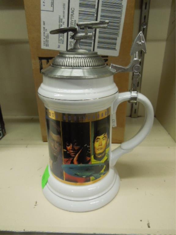 Star Trek Stein w/ Pewter Enterprise lid: 30th anniversary commemorative - "Final Frontier" limited edition 1654/1966, 8 3/4" h with crew pictures featured around stein, with certificate of authenticity Condition; missing red plastic front of