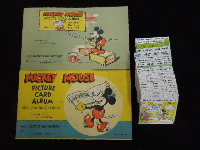 96 Mickey Mouse Picture Cards w/2 Albums: Mickey Mouse bubble gum Phila. PA 1930's with cards albums vol. 1 & 2 with drawings by Walt Disney. Condition: Minor Wear to cards, some wear to card albums. Vol. 1 name signed in pencil, minor staini