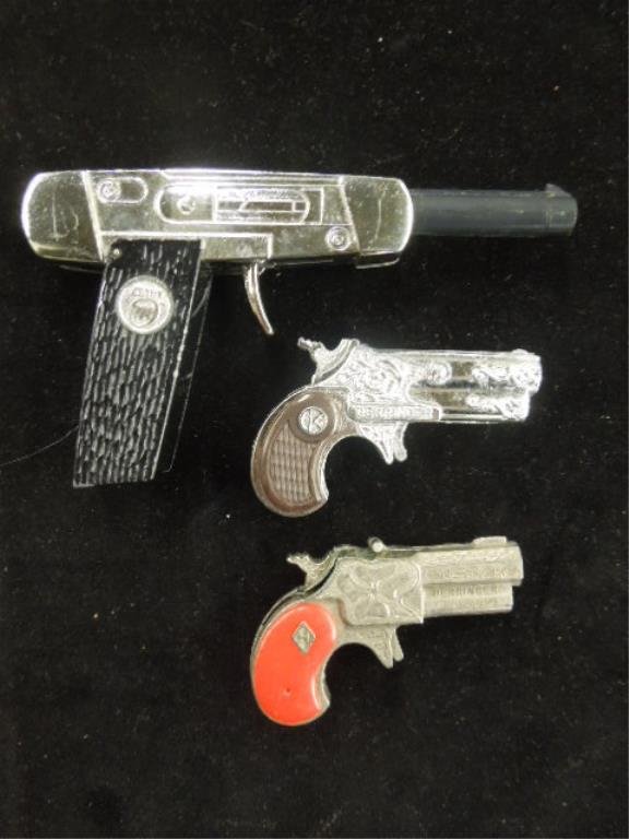 2 Derringer Toys Pistold & Dietz Folding Pistol: 2 Derringer Toys Pistold & Dietz Folding Pistol. Condition: Minor wear to painted plastic surfaces