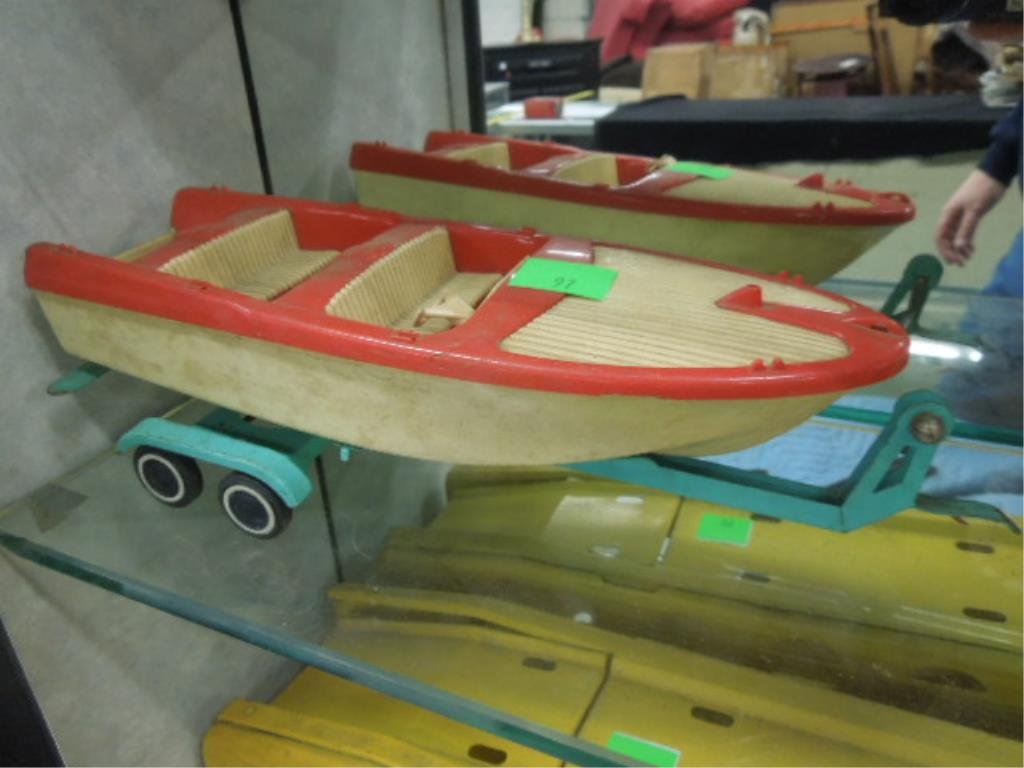 Vintage Steel Boat and Plastic Trailer: Tonka Clipper, 13" l Condition; Boat missing windsheild and motor, minor paint wear on trailer