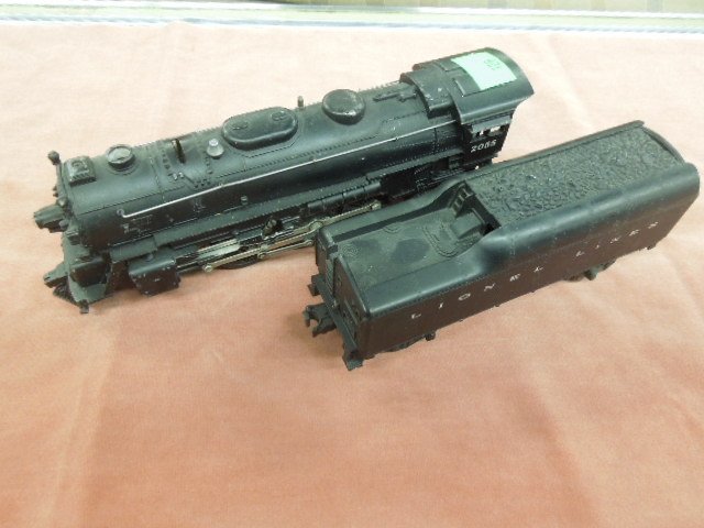 Lionel Locomotive and Tender: Engine # 2055, Condition; slight finish loss throughout, headlight lense chipped