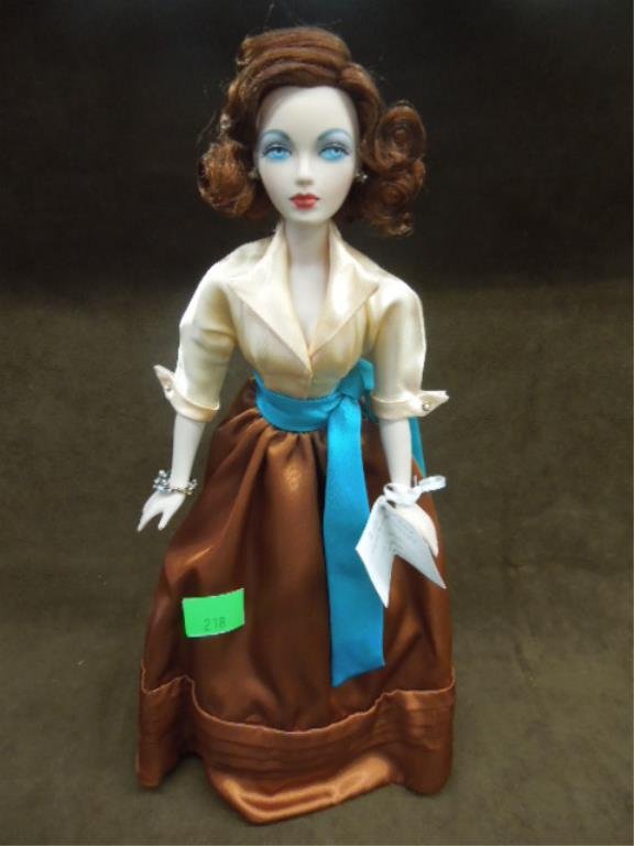 Gene "Mood Music" Porcelain Doll: Gene "Mood Music" porcelain doll, 15 1/2", The Gene Marshall collection, with small tin plaque & bracelet, designed by Mel Odom (signed in card), 1999 Ashton-Drake Galleries with original box. CONDITI