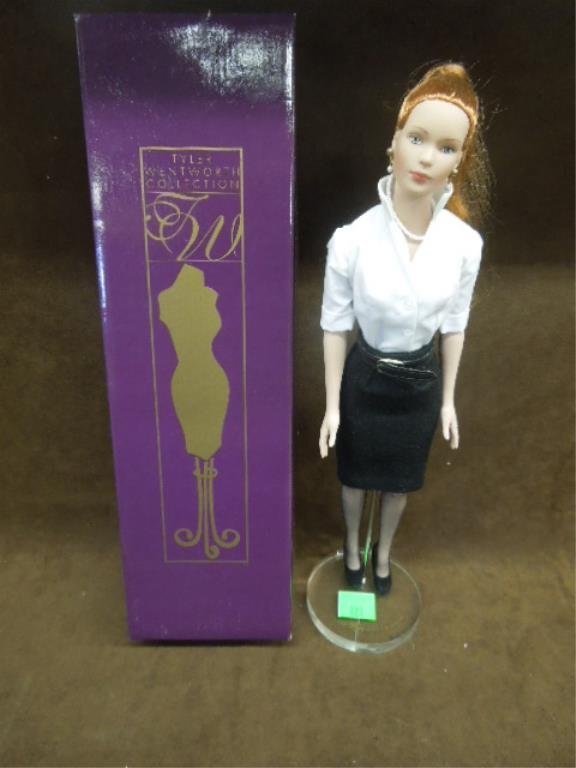 Tyler \"Signature Style\" Porcelain Doll #99801: Tyler \"Signature Style\" porcelain doll #99801 (red head), from The Tyler Wentworth collection, with necklace & sun glasses, plus brief case form collection pamphlet, from Robert Tonner Doll Company,