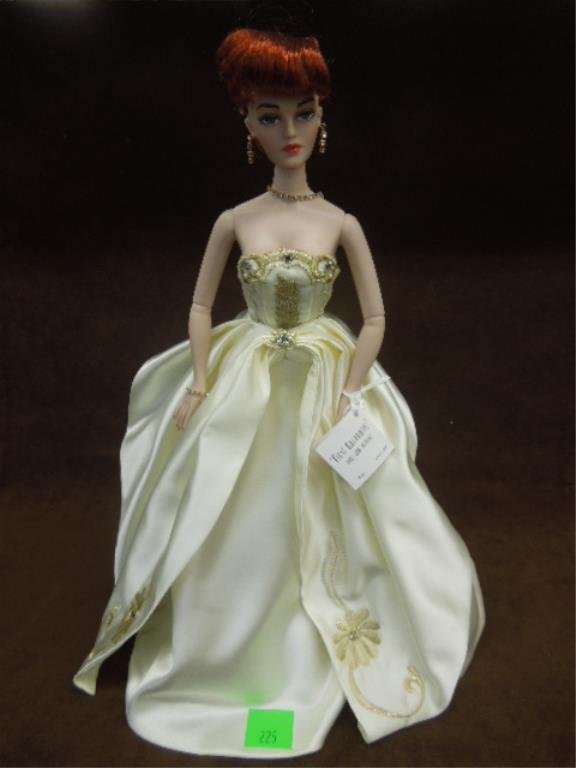 Madra "First Encounter" Porcelain Doll, 15 1/2": Madra "first Encounter" porcelain doll, 15 1/2" with Madra accessories, necklace (on doll) & purse, The Gene Marshall collection, designed by Mel Odom (signed in card), Ashton-Drake Galleries with ori