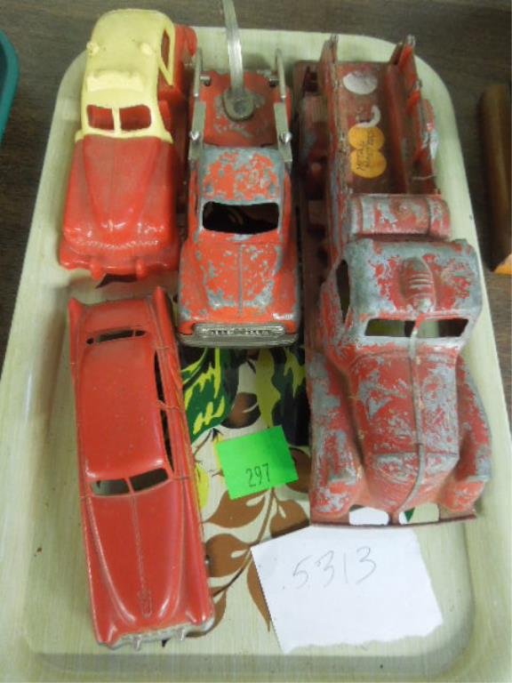 Lot (4) Metal and Plastic Toy Trucks & Cars: including (3) metal - Metal Masters Fire engine, Hubley Kiddie Toy Tow truck, and Tootsietoy sedan, plus plastic Taxi Condition; wear and paint loss on all metal vehicles, Tootsietoy sedan missing par