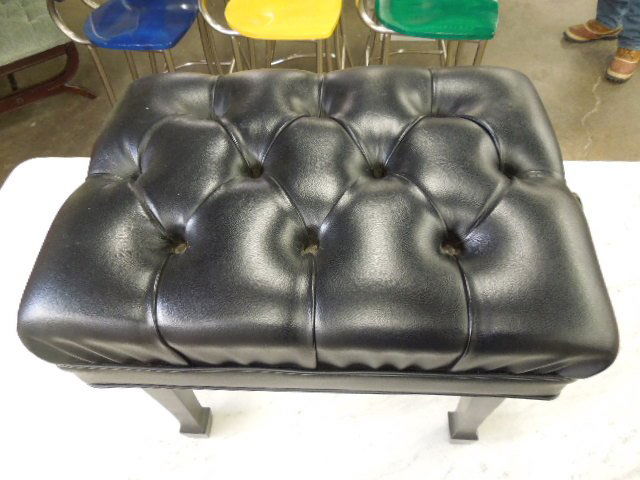 Professional adjustable piano stool: Professional adjustable piano stool, tufted black leather seat, black lacquered base, metal accordion mechanism beneath, late 20th c. 22 1/2" x 16 1/2” x adjustable. CONDITION: Very good.