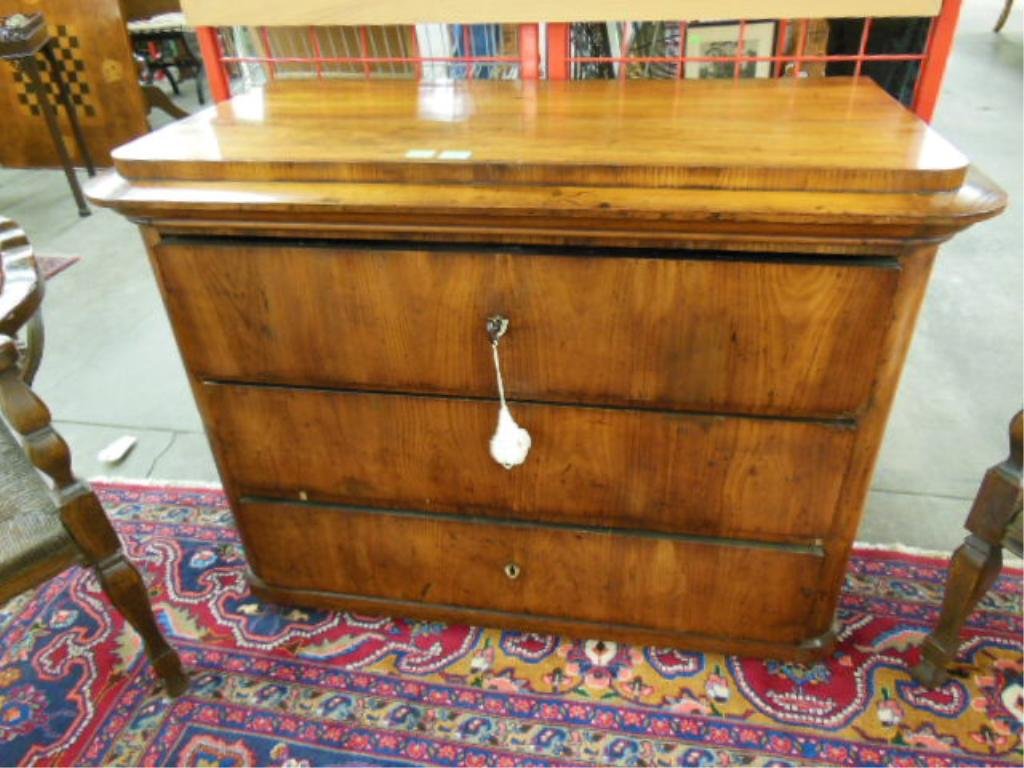 Antique Biedermeier Three Drawer Chest: Antique walnut Biedermeier three drawer chest with modified flat coffer top, ivory inlaid escutcheons and casters, Continental, c. 1830, 301/2"h x 41"w x 19 1/2"d Condition; old or original surfaces l