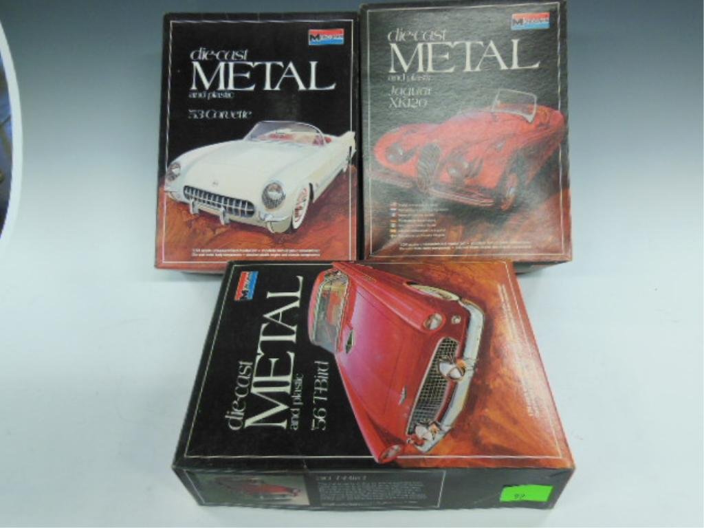 Die Cast & Plastic Models: 3 Die Cast & Plastic Models by Monogram Includes: 56' T-Bird, 53'-Corvette, and Jaguar XK-120. CONDITION: New in boxes, boxes are open, models are complete.