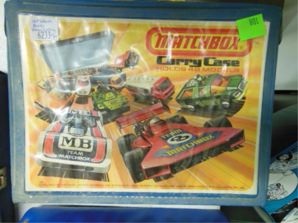 Matchbox Collectors Case w/24 Vehicles: Matchbox collectors case with twenty-four vehicles by Hot Wheels, Husky & Johnny Lightning. CONDITION: Good, used. Shows wear.