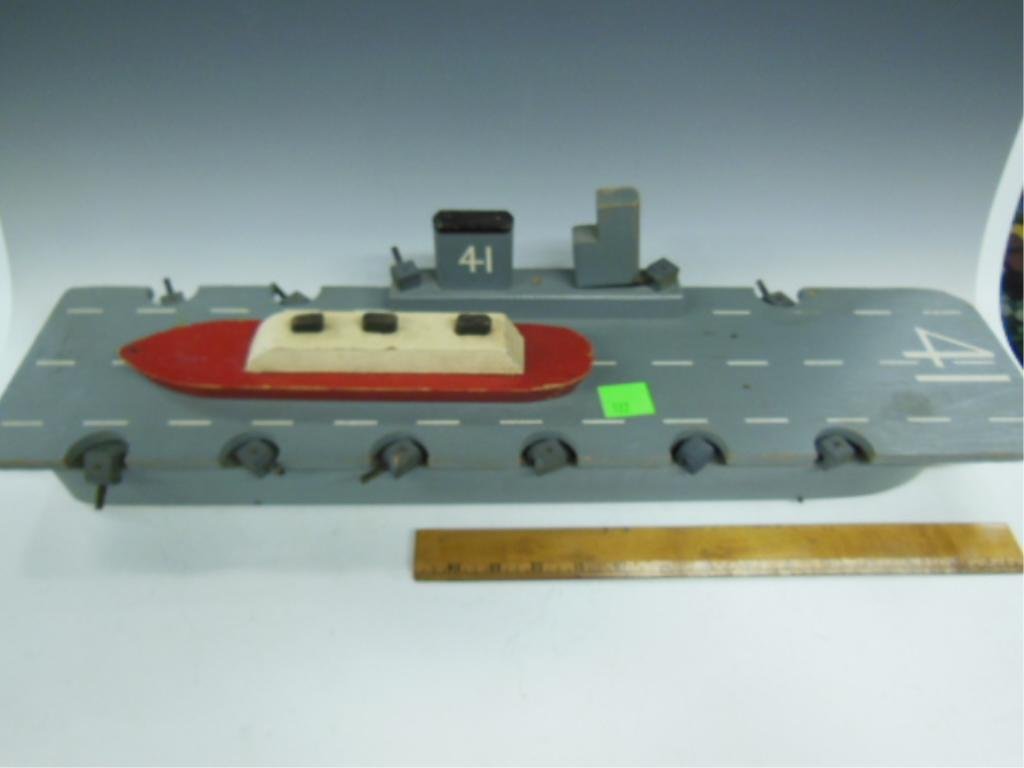 Wooden Aircraft Carrier & Small Ship Toys: Hand made wooden aircraft carrier & small ship toys. CONDITION: Shows some wear.