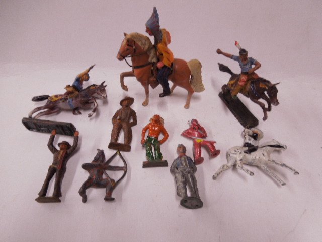 Plastic & Metal Cowboy & Indian Figures: Lot of miscellaneous plastic & metal cowboy & Indian figures by Elastoline & other. CONDITION: Fair, showing paint loss & wear.