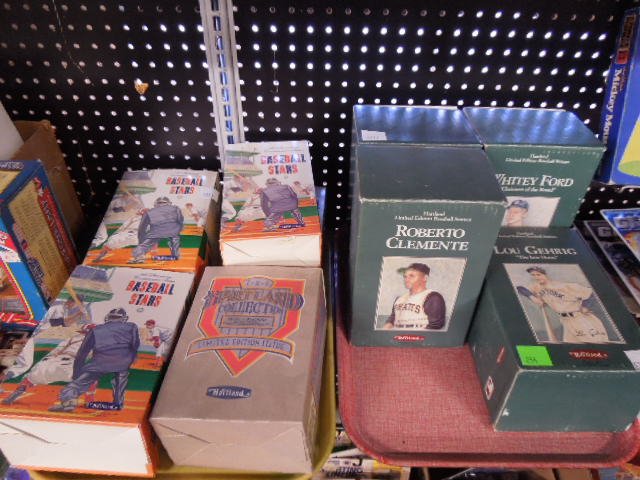 Baseball Statues by Hartland: Lot of nine limited edition baseball statues by Hartland. Includes: Lou Gehrig, two Whitey Ford, Roberto Clemente, Yogi Berra, Honus Wagner, Edwin d. Snider, babe Ruth & Roger Maris. CONDITION: Good i