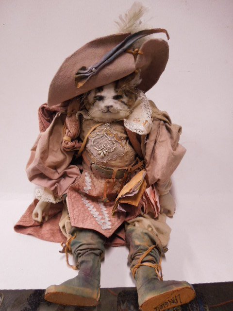 "Puss-In-Boots" Italian Marionette by Langlois: "Puss-in-Boots" Italian marionette by AJ Langlois. Highly detailed, velvet, cotton & leather outfit. 32" tall. CONDITION: Very good, used.