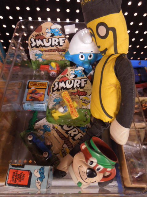 Lot of Character Toys: Lot of mixed character toys including; Smurfs, Yogi Bear, Mr. Peanut Condition; fair, used, has wear
