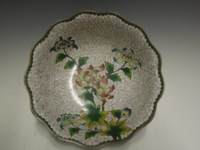 Chinese Cloisonne Bowl: Chinese Cloisonne bowl, white ground with Peonies flowers, scalloped edge, base incised "Made in China", mid 20th c. Diameter 8"; 2 3/4"H. CONDITION: Very very minor ding losses along inner edge.