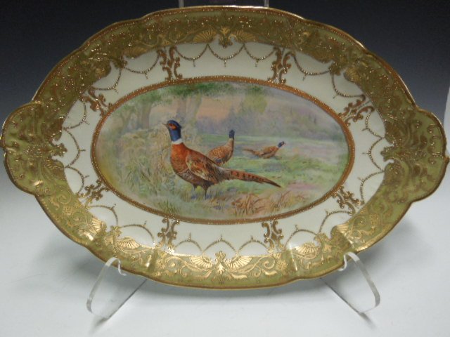 Nippon Game Platter: Nippon Game platter, scalloped & gilt border with transfer & painted Pheasant center; 19th/20th c. 17 1/4" x 11". CONDITION: No issues noted.