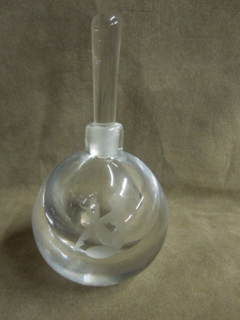 OFC (Orrefors?) etched perfume bottle: OFC (presumed Orrefors) crystal perfume bottle, with etch nude woman holding Orb, ground stopper, 1378 mark and signed on bottom, 2 3/4" diameter & 5"h (including stopper). CONDITION: Very minor wear,