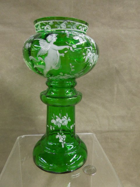 Mary Gregory type vase: Mary Gregory type vase, green glass with opalescent overlay of Putti, urn form 19th/20th c. H 9 3/4". CONDITION: Small nick on top rim.