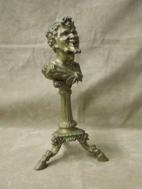 Bronze Devil Face Inkwell: Bronze Devil Face inkwell, hinged lion face top (missing insert), column base on 3 hoof form feet, 10 1/2"h. CONDITION: Some wear from age, missing inkwell.