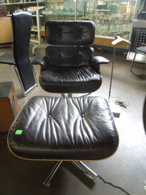 Frank Doerner Charles Eames Style Arm Chair: Frank Doerner Charles Eames style arm chair & ottoman, laminated wood & brown leather tufted upholstery, mid 20th C. CONDITION: Moderate wear, one flat caster on chair missing