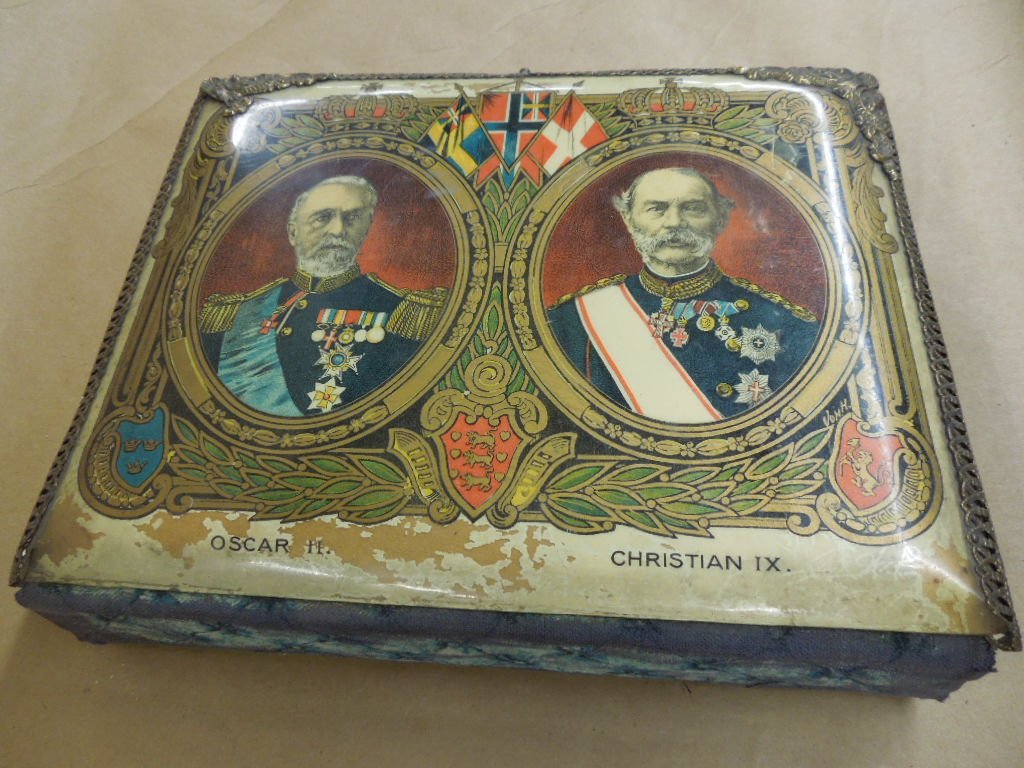 Late 19th c. Photo Album: Late 19th c. Photo Album - Studio Photos with King Oscar II and Christian IX (Scandinavian kings) on cover with 3" and 5" photos, brass claspCondition; cover worn especially on edges, photos have some