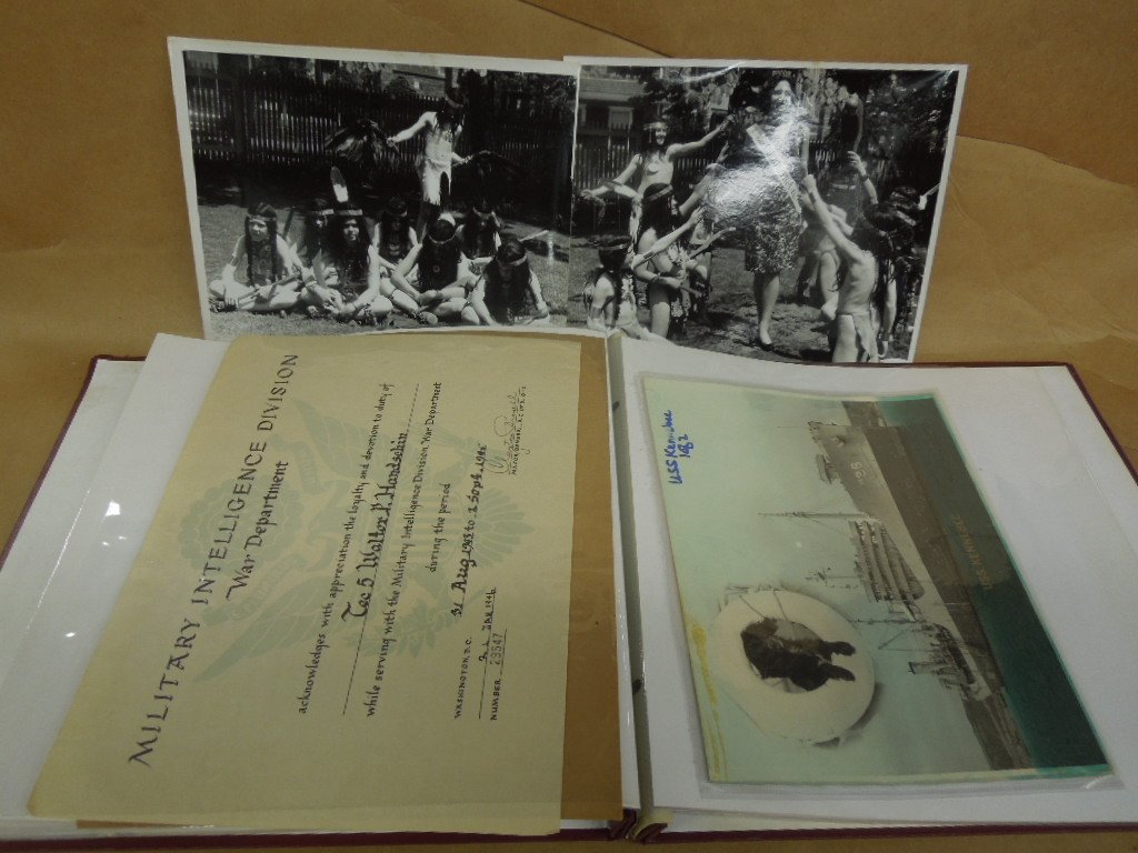Album Vintage photos & certificates: Album Vintage photos & certificates including; Miss Penna, Warship & propeller, paratrooper, We Like Ike, Smokey the Bear sheet music, War Dept certificate, plus moreCondition; some wear from age