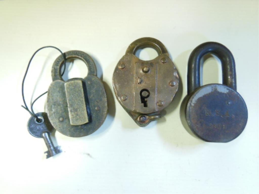 2 RR Switch & Other Lock: Two railroad switch & other lock including; one Junkunc Bros. American lock (R.E.A. 1820) & two switch locks - The Hall Signal Co. (with attached key) & Western Union Telegraph Company, Hall lock has