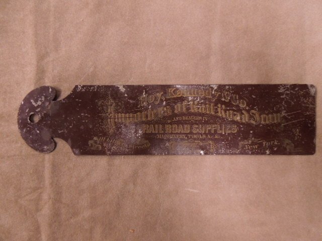 19th c. metal RR supplier advertising piece: Metal advertising device: Hoy, Kennedy & Co./ Importers of Rail Road Iron/ and Dealers In/ Rail Road Supplies/ Machinery, Tools &c &c./ John P. Kennedy/ W.E. Hoy/ III Liberty Street/ New York, c. 1870