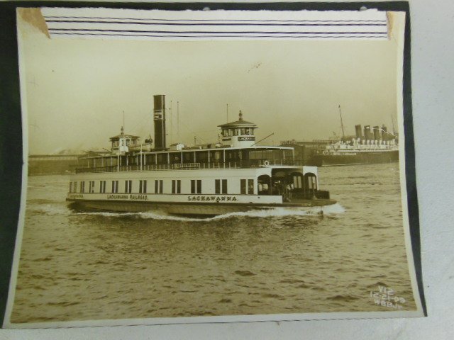 Vintage Lackawanna Railroad Ferry photo, NY Harbor: Vintage photograph, Lackawanna Railroad Ferry in New York Harbor, c. 1909, with S.S. Lusitania docked in background. [Stamp verso: "Wm. B. Barry, Jr./D.L. & W. R.R. Co. / Engineering Dep't. Hoboken, N