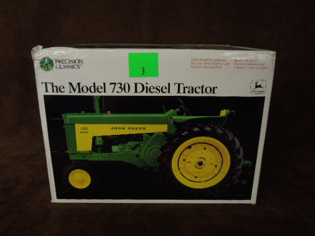 John Deere Die Cast Diesel Tractor: Precision Classics John Deere model 730 die-cast diesel tractor. CONDITION: New.