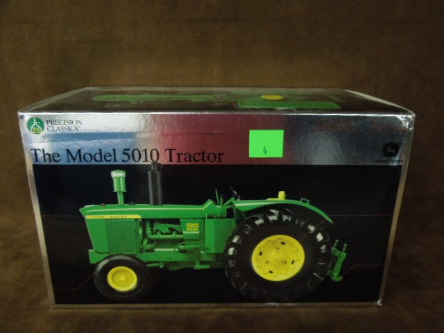 John Deere Die Cast Tractor: Precision Classics John Deere model 5010 die-cast tractor. CONDITION: New.