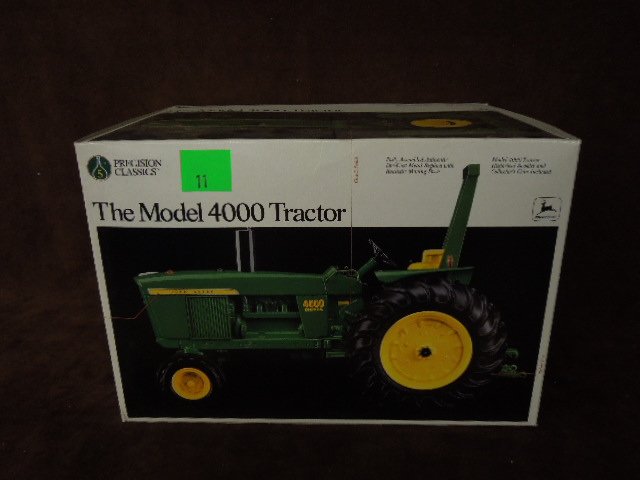 John Deere Die Cast Tractor: Precision Classics John Deere model 4000 die-cast tractor. CONDITION: New.