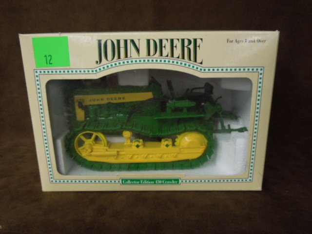 John Deere Die Cast Crawler by Ertl: John Deere model 430 die-cast crawler, by Ertl. CONDITION: New.