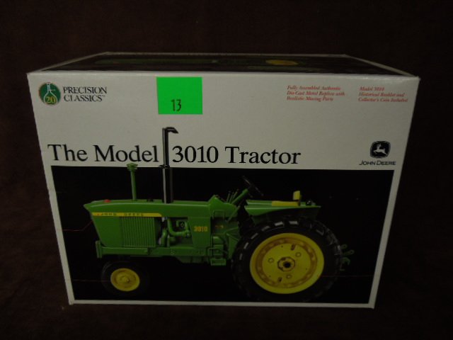 John Deere Die Cast Tractor: Precision Classics John Deere model 3010 die-cast tractor. CONDITION: New.