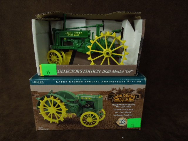 2 John Deere Die Cast Tractors by Ertl: Two John Deere die-cast tractors by Ertl. One 1924 model "D", one 1928 model "GP". CONDITION: New.