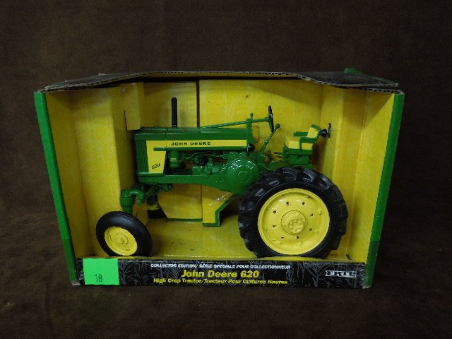 John Deere Die Cast Tractor by Ertl: John Deere 620 die-cast tractor by Ertl. CONDITION: New.