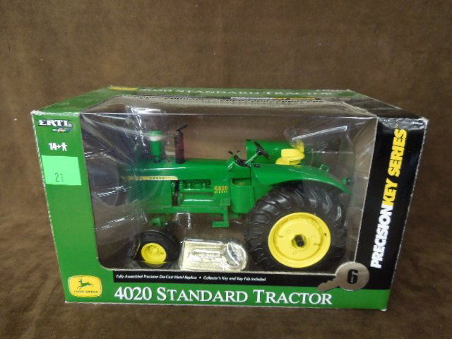 John Deere Die Cast Tractor by Ertl: John Deere 4020 die-cast tractor by Ertl. CONDITION: New.