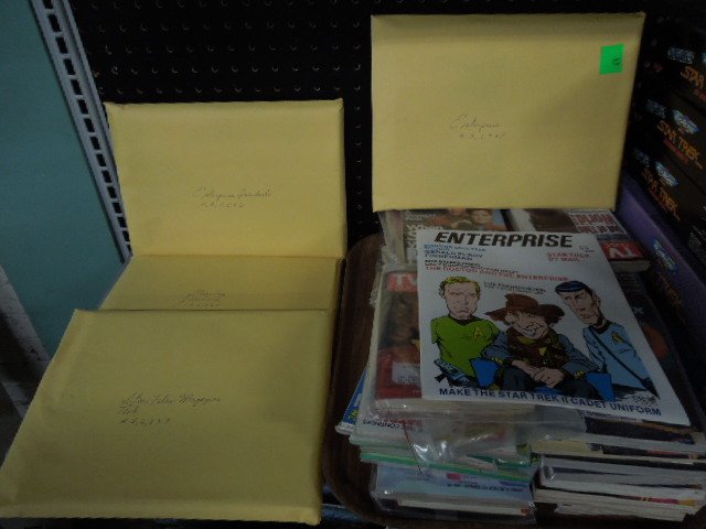 Tray lot of Star Trek TV Guides & Enterprise Mag.: Tray lot of Star Trek TV Guides, & Enterprise Magazines. CONDITION: Good.