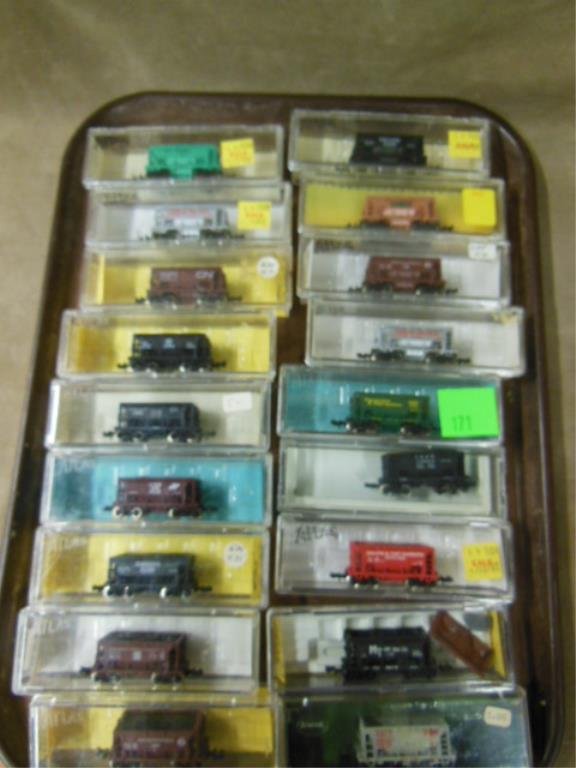 "N" Gauge Coal Cars: Eighteen Atlas "N" gauge old store stock coal cars; original plastic boxes. CONDITION: Minor wear form age.