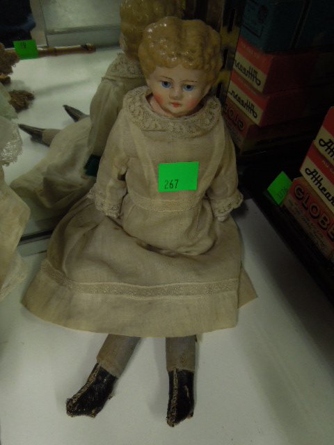 19th C. Composition Head Doll: 19th C. composition head doll, bisque arms, cloth body, hand painted, 14 1/2" h. CONDITION: Minor paint loss, some wear from age.