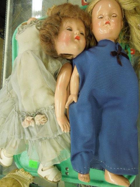 2 Effanbee Composition Dolls: Two Effanbee composition dolls, both jointed with sleep eyes, one needs restringing, one 18" & one 22". CONDITION: Some wear & light crazing to both dolls.