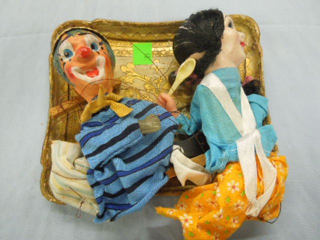 2 Composition Face Marionettes: Two composition face marionettes, one clown & one girl, with hand painted faces. CONDITION: Some wear to faces paint loss & minor surface cracks.