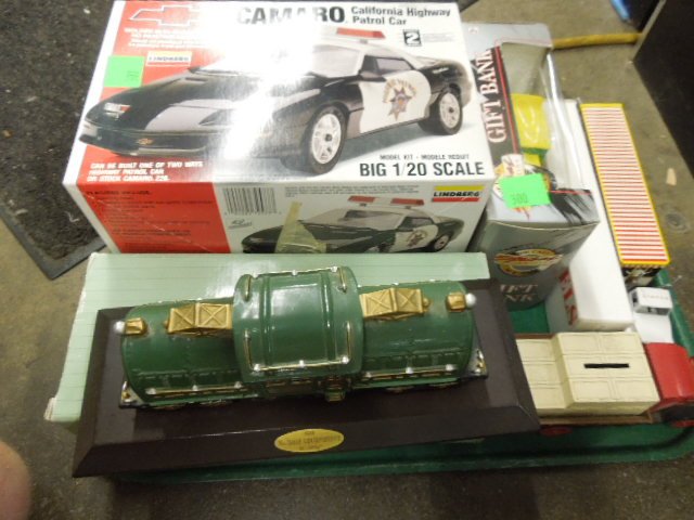 Models, Cast Banks & Truck: Models, cast banks & truck, including; (2) models, Camaro (Cul Hwy Patrol) & Mercedes 300 S.L. both with original boxes (2) die cast banks, Mountain Dew truck unused in original box & Tractor Supply C