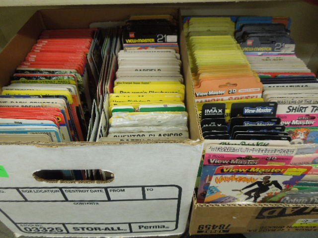 260+ Children's View Master Reels: 260+ children's View Master reels, 3 disc reel packs, unopened in original packages featuring; children's classic stories, plus TV shows, cartoon & other. CONDITION: Some wear to unopened packs.